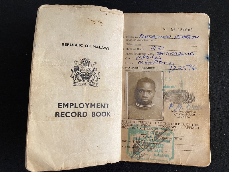 Pearson Kumbemba's Employment Record Book for a two-year contract from 1972-74, which documents his work history at Rustenberg Platinum Mintes