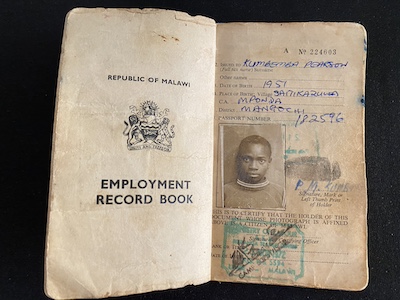 Pearson Kumbemba's Employment Record Book for a two-year contract from 1972-74, which documents his work history at Rustenberg Platinum Mintes