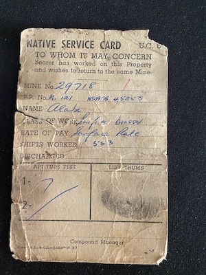 Alabi Mitawa, a Muslim man from Katema (30 km from Mangochi), left on his first WNLA contract in 1964, at the age of 20. He completed three contracts with WNLA, with the final one concluding in 1973. He was married with one child when he left for his first contract. While away on his third contract, his third child died as a baby. In the first interview, he recounts the process of recruitment and screening, life in the mine barracks, learning Fanagalo (the language developed for workers in the mines), and consumer purchases he made. His nostalgic view of his time with WNLA is reinforced by his pride at the house he was able to build for his family upon his return. In the second interview, he elaborates upon his family’s background, discussions with his wife about whether to begin labor migration, the process of communicating with family and sending them remittances, and his feelings about the end of the migration program in 1974.