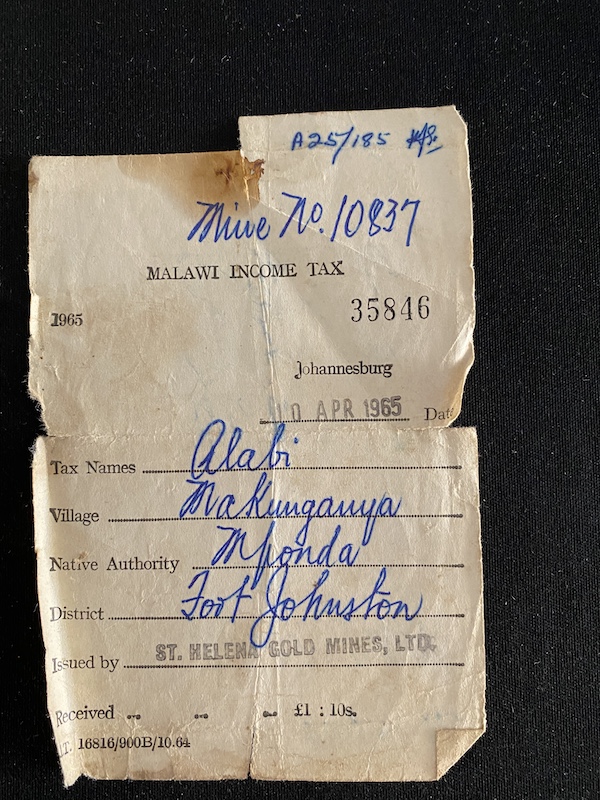 Alabi Mitawa, a Muslim man from Katema (30 km from Mangochi), left on his first WNLA contract in 1964, at the age of 20. He completed three contracts with WNLA, with the final one concluding in 1973. He was married with one child when he left for his first contract. While away on his third contract, his third child died as a baby. In the first interview, he recounts the process of recruitment and screening, life in the mine barracks, learning Fanagalo (the language developed for workers in the mines), and consumer purchases he made. His nostalgic view of his time with WNLA is reinforced by his pride at the house he was able to build for his family upon his return. In the second interview, he elaborates upon his family’s background, discussions with his wife about whether to begin labor migration, the process of communicating with family and sending them remittances, and his feelings about the end of the migration program in 1974.